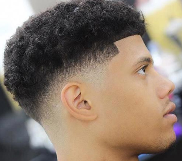 2.Mid Skin Fade Curly Hair