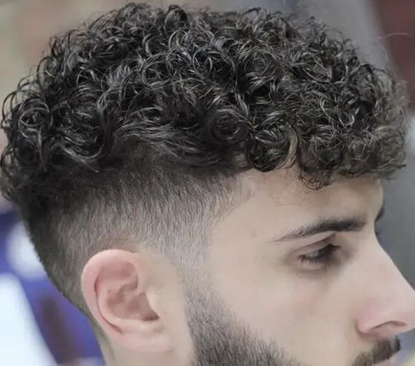 49. Ultra Curly Hairstyle for Men with Hairline Retreat